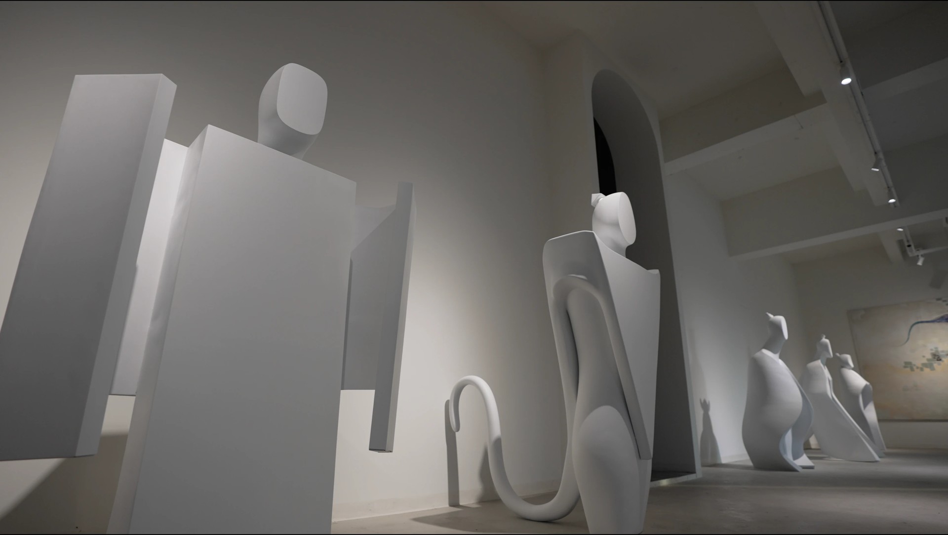 Five Element Deities installation with five white mythic figures in an interior